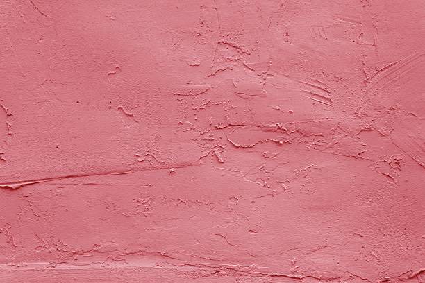 istock Rough traces of pink plaster on the wall. 2218093327