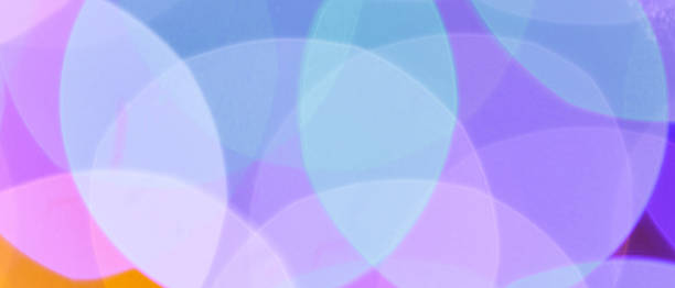 istock Abstract Bokeh Background with Overlapping Pastel Purple and Pink Blurred Lights Soft Focus Effect 2218093667