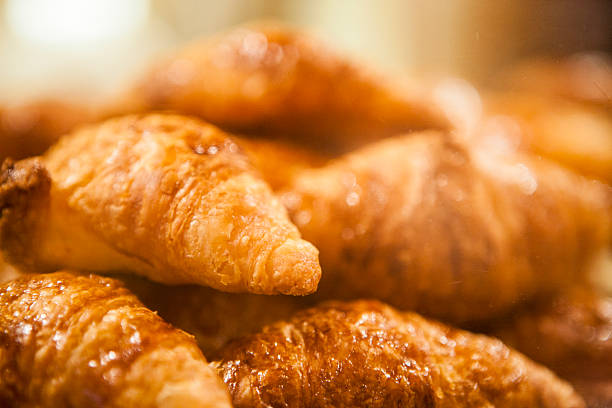 istock Close-Up of Buttery Croissant Layers 2218094754
