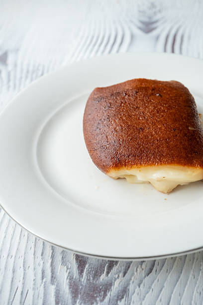 istock kazandibi turkish dessert  on white plate 2218106288