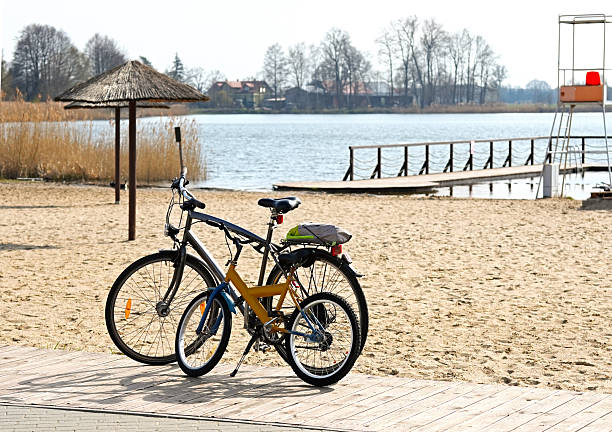 Biking on beach early morning at Itaguare, Bertioga, Brasil. Life style, healthy behavior