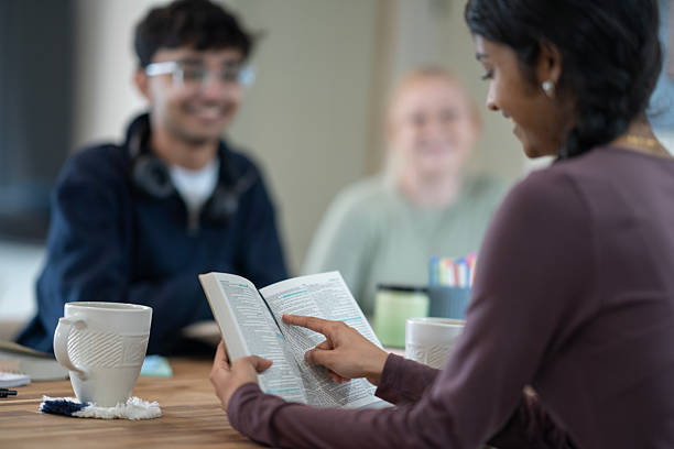 istock Group of Friends Engaged in a Bible Study Session 2218106929