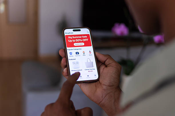 istock Customer browsing summer sales on shopping app 2218107142