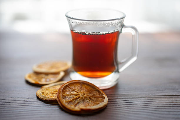 istock Rooibos tea in glass cup  on wooden background 2218109069