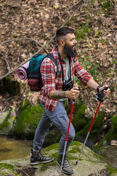 istock Joyful Hiker Enjoys Forest View from Stream Rock 2218118444