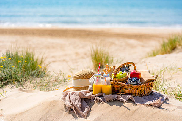 istock Sunny summer day perfect for a beach picnic 2218119868