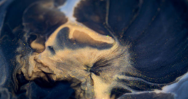 istock Lava paint dye spread glitter ash stream spilling 2218119986