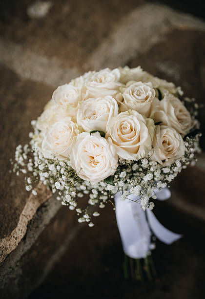 istock Wedding bouquet made of fresh white roses. 2218123082