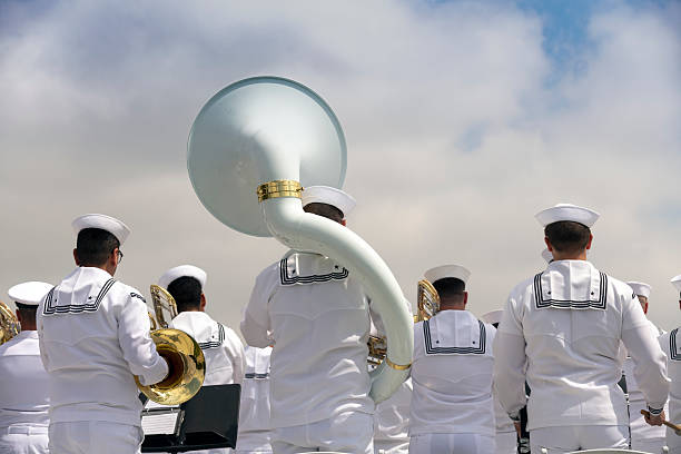 Rolling Hills Estates CA USA - May 26, 2025:\nNavy band gets ready to perform during the Memorial Day Observance at Green Hills Memorial Park which featured skydivers, procession of Colors, including a Mounted Posse, reading of letters home to family, flyovers, and the Caber Feidh Pipe Band.