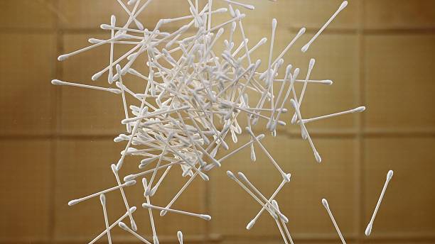 istock Cotton Swabs Arranged Below the Glass Table 2218126277