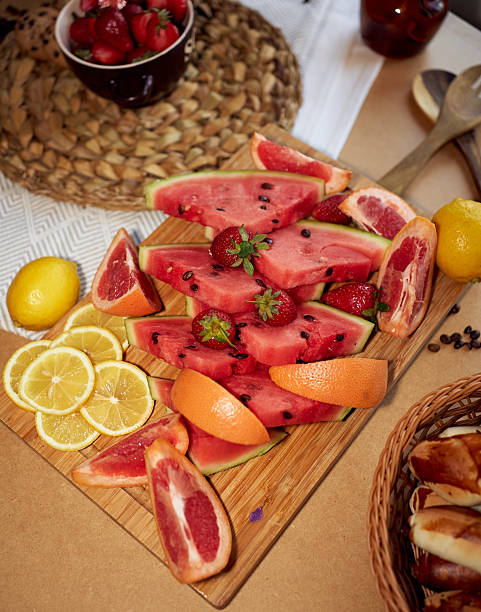 Beautiful still life with different fruits. Still life in red-green tones.