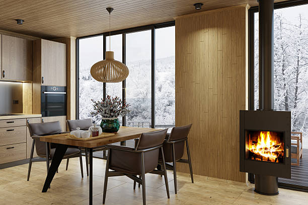 istock Scandinavian Oak Kitchen and Dining Area with Fireplace and Winter Forest View 2218128934