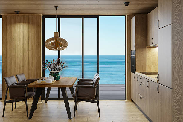 istock Scandinavian Log Cabin Kitchen with Oak Interior and Ocean View 2218128979