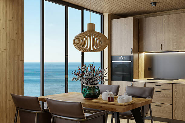 istock Scandinavian Log Cabin Kitchen with Oak Interior and Ocean View 2218129154