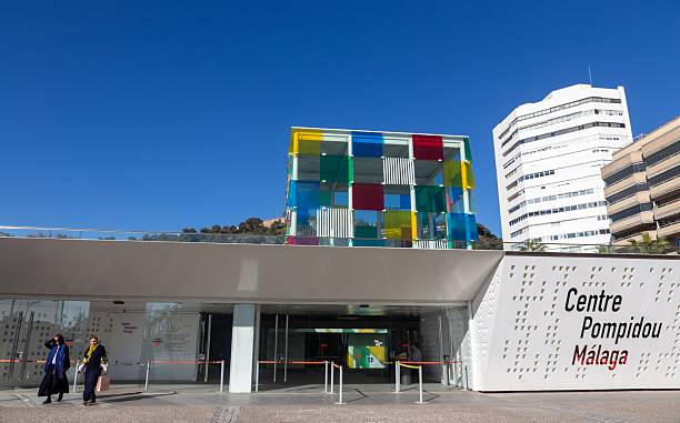 Malaga, Spain - June 8, 2024: Entrance to the Centre Pompidou Málaga, a branch of France's Georges Pompidou National Centre for Art and Culture located in the El Cubo space in the Spanish city of Malaga.