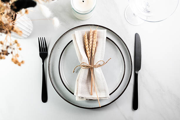 istock Elegant minimal table setting with wheat decoration in neutral tones 2218132812