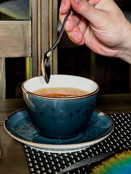 Tea, cup, hands, man, guy, tea party, saucer, spoon, breakfast, lunch, food, drink, hot, cafe, coffee shop, for website, for blog, for video, for visual, beautiful, aesthetics, play of light
