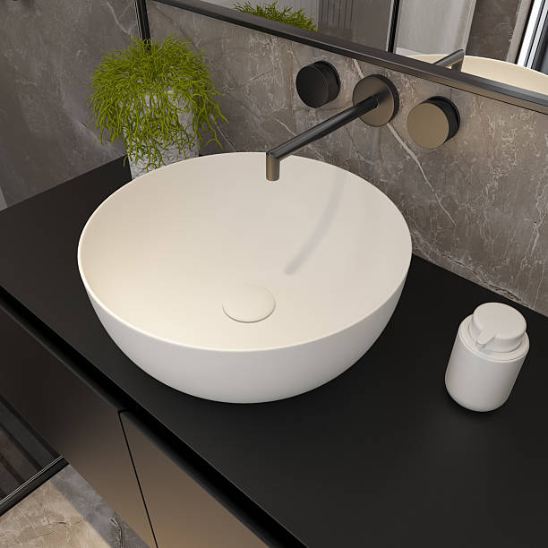 istock Modern Sink Bathroom Close-Up with Stone and Black Accents 2218134917