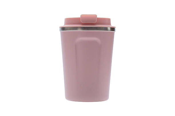 istock Pink travel mug for on the go use with its convenient lid and compact design isolated on a white background. 2218136494