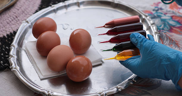 istock Discovering the joy of coloring eggs with vibrant Easter egg paints 2218137732