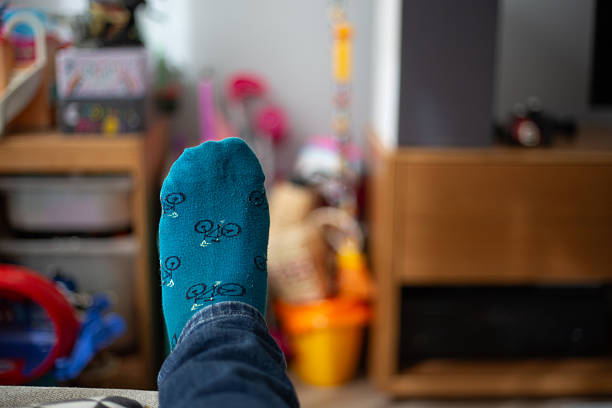 istock Blue cycling socks on a interior room scene 2218140944