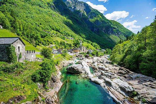 istock Man jumping into the river Versasca River in Lavertezzo, Ticino 2218141685