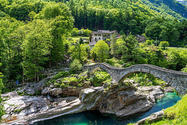Panoramic Double arch stone bridge at Ponte dei Salti with waterfall, Lavertezzo, Verzasca, Canton Tessin.