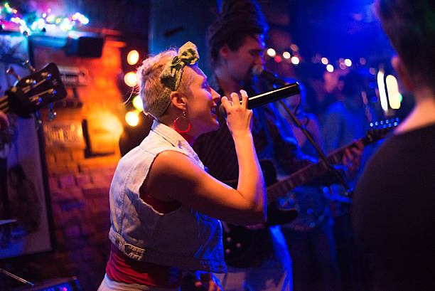 istock Rock band playing on the concert 2218145140