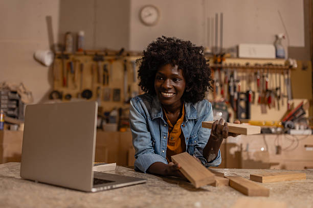 istock Engaged individual working with woodworking materials 2218145145