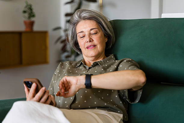 istock Mature woman checking her smartwatch 2218145146