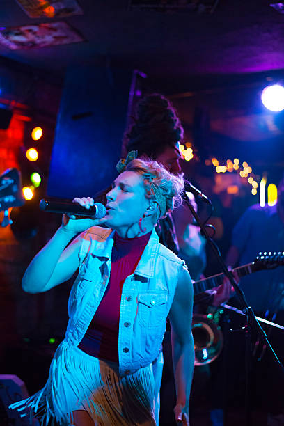 istock Rock band playing on the concert 2218145175