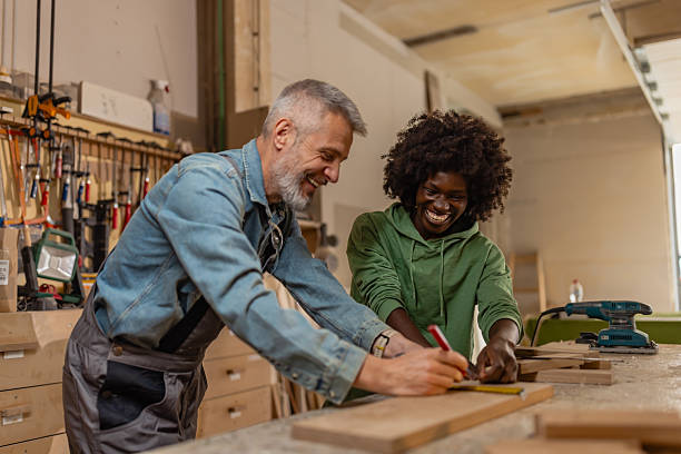 istock Measuring and Cutting Wood with Enthusiasm 2218145339