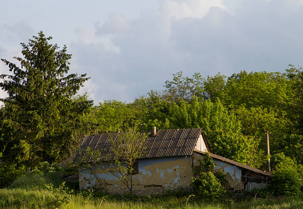 Village house on a hill. The concept of life and recreation in the village.Tourism in remote places