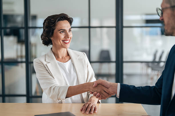 istock Professional business meeting between colleagues in a modern office 2218152281