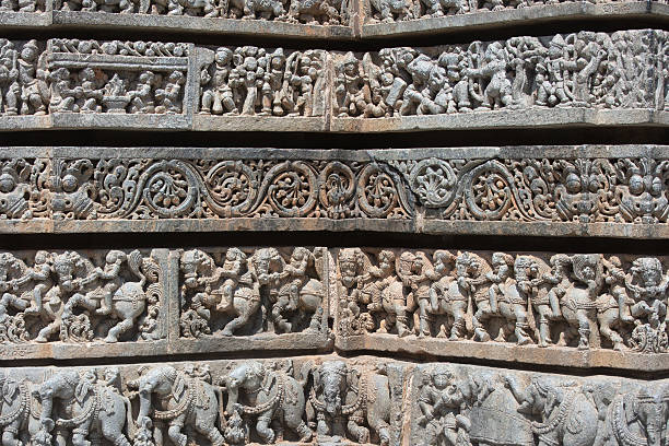 istock Intricate Stone Carvings on Temple Wall 2218155005