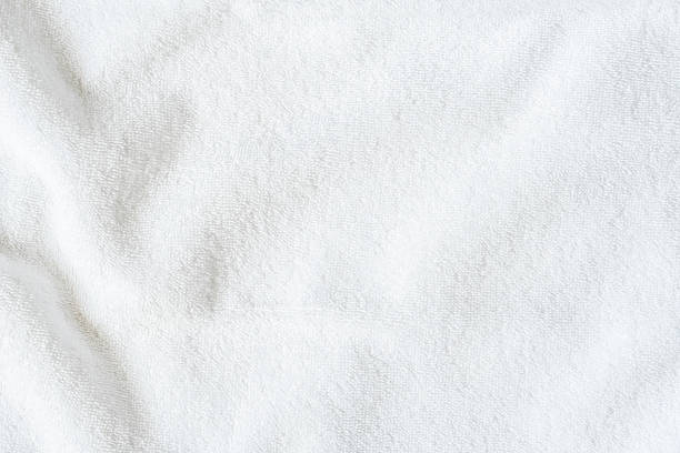 istock White towel texture background or beach bath fabric, kitchen wiper towel or plain blank cloth bathroom rug made of soft clean cotton fiber material for linen laundry backdrop 2218155490