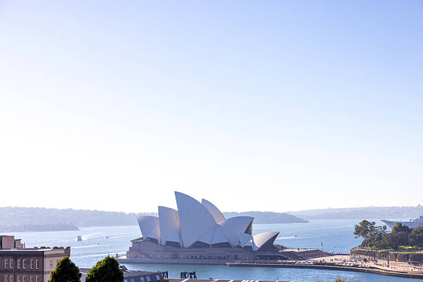 Sydney, Australia - June 01, 2025: Sydney Opera House in morning sun, Sydney's Opera House is a UNESCO World Heritage site