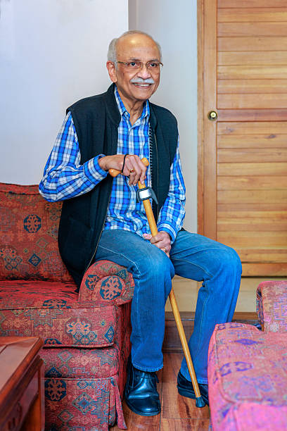 istock Senior Indian Man With Walking Cane 2218161353