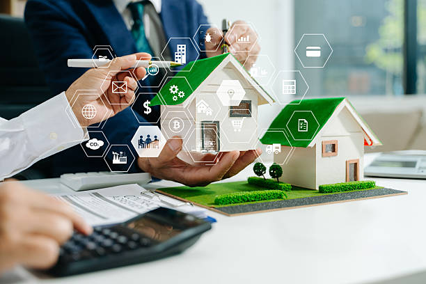 istock Sustainable architects presenting green building models, solar panels, and recycling symbols. Future clean energy and smart city 2218166665