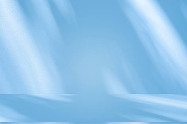 istock Studio style background wall decoration presentation uses white and blue tones. with shadows cast from a nearby window, concept creating a decorative 2218170324
