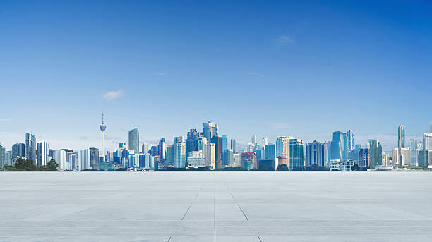 istock Panoramic skyline of modern cityscape over empty concrete floor 2218174717