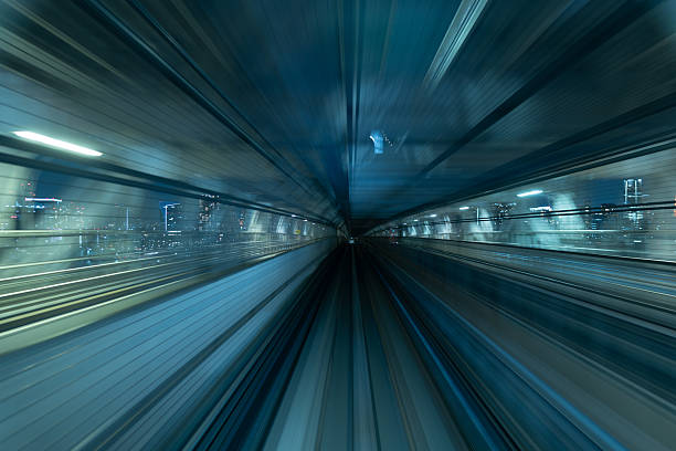istock Curved Monorail Track Inside Tokyo Tunnel at Night 2218177139