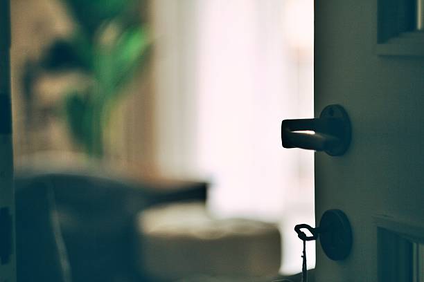 istock Half opened door into the cozy home interior 2218186176
