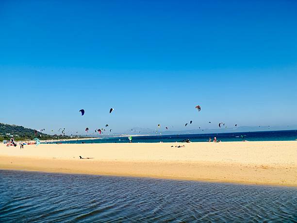istock Colourful sails of the kite surfers over Tarifa Beach. 2218187382