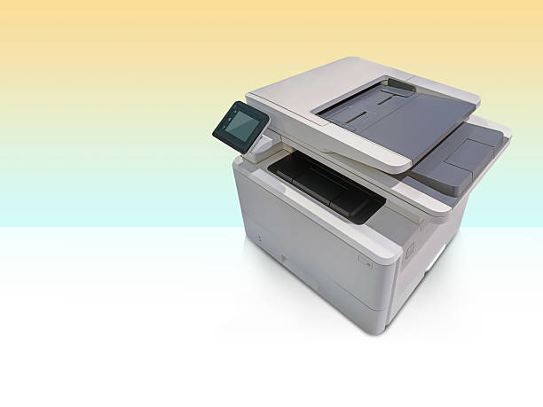 istock top side view right white and black printers on white floor, yellow and green background, technology, object, comfortable, work, speed, electric, copy space 2218191917