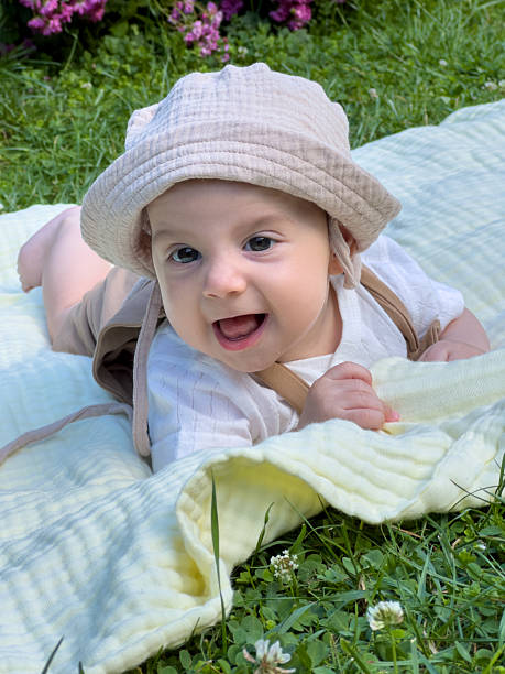istock Joyful Baby Playing Outdoors 2218192281