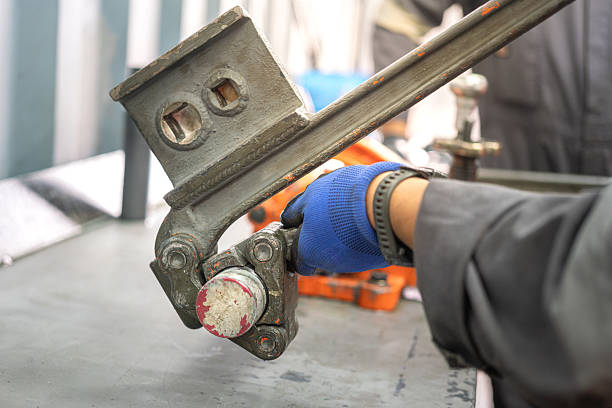 istock A mechanical engineer is using friction tong to tightening a tool. 2218194982
