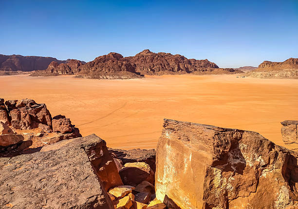 istock Dramatic Rocky Outcrop Overlooking the Wadi Rum Desert, Jordan 2218205884