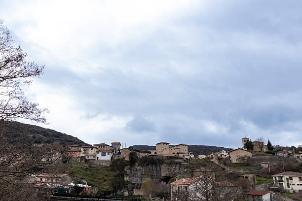 istock Rupit, picturesque medieval catalan village perched on a cliff under cloudy sky 2218206096