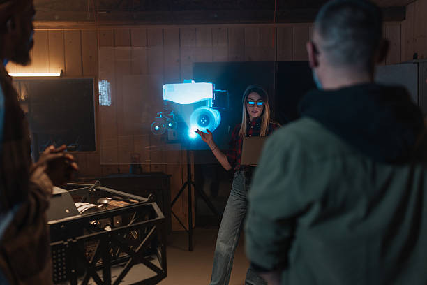 istock Team of Robotics Researchers Analyzing Holographic Projection of Engine 2218206794